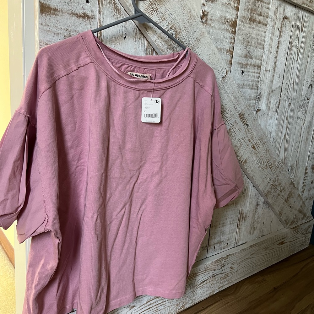 Oversized Top flush pink from Free People.